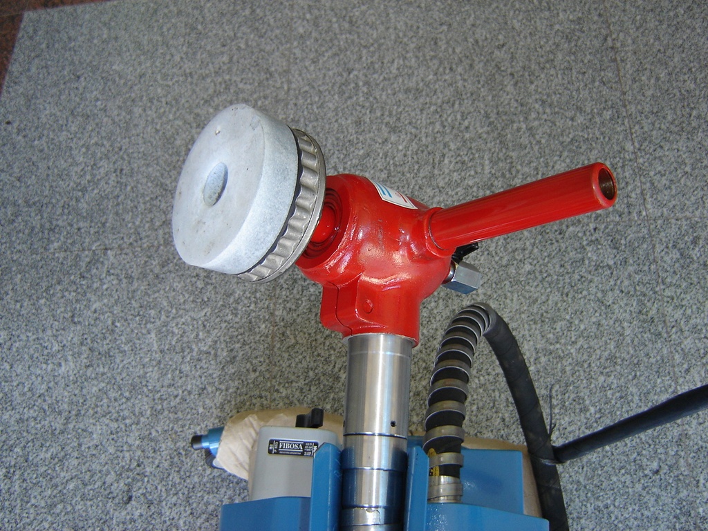 Cabezal pulidor para eje flexible